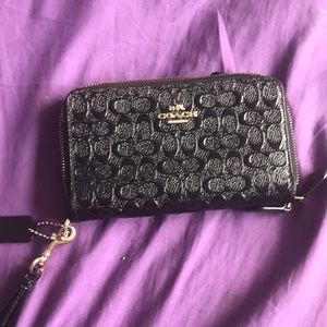 A coach wallet wristlet